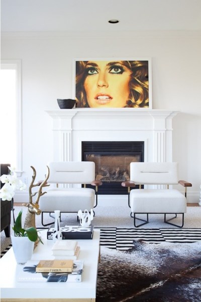 thumbnail_layering-rugs-cowhide-over-striped-by-christine-dovey